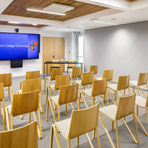 Yusuf Hamied Court Seminar Room at Christ’s College, Cambridge, set up in a clasroom style featuring a modern teaching space with seating and presentation facilities. The Yusuf Hamied Court Seminar Rooms 2 & 3 offer a modern and highly flexible meeting rooms in Cambridge, ideal for a wide range of business and academic events.