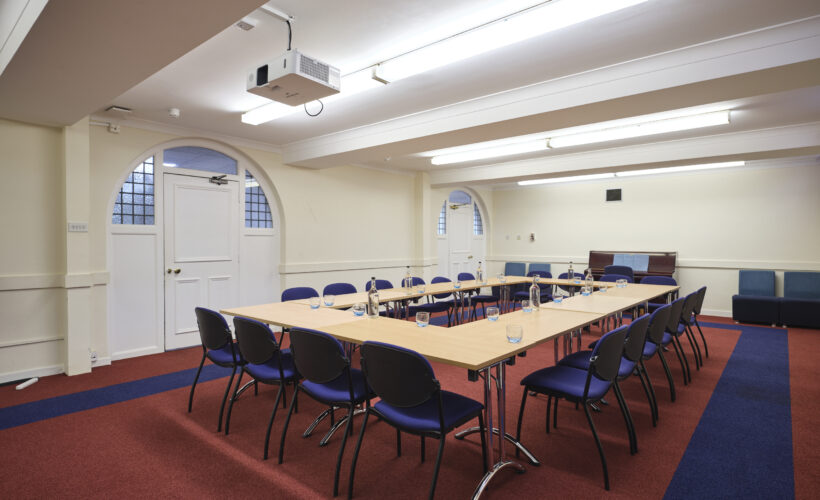 The Amenity Room at Christ’s College, Cambridge, arranged for a meeting or workshop featuring flexible seating and a spacious layout suitable for small group events.