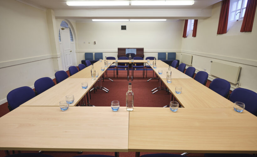 The Amenity Room at Christ’s College, Cambridge, arranged for a meeting or workshop featuring flexible seating and a spacious layout suitable for small group events.
