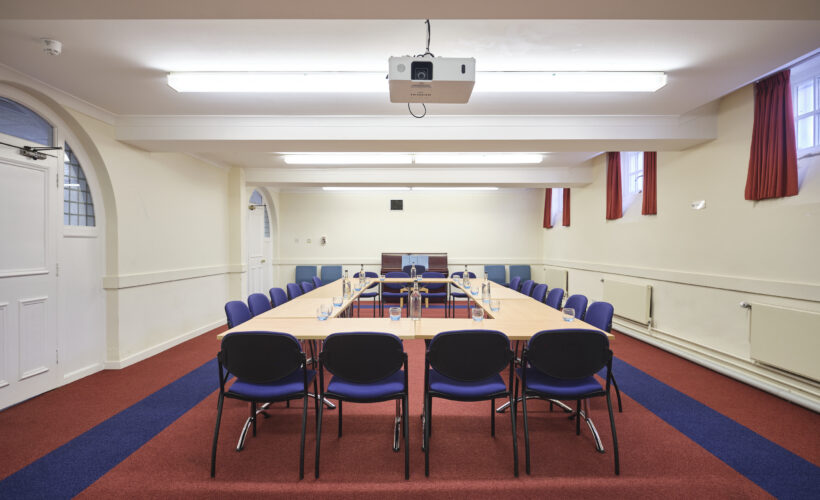 The Amenity Room at Christ’s College, Cambridge, arranged for a meeting or workshop featuring flexible seating and a spacious layout suitable for small group events. This space is an ideal training room in cambridge