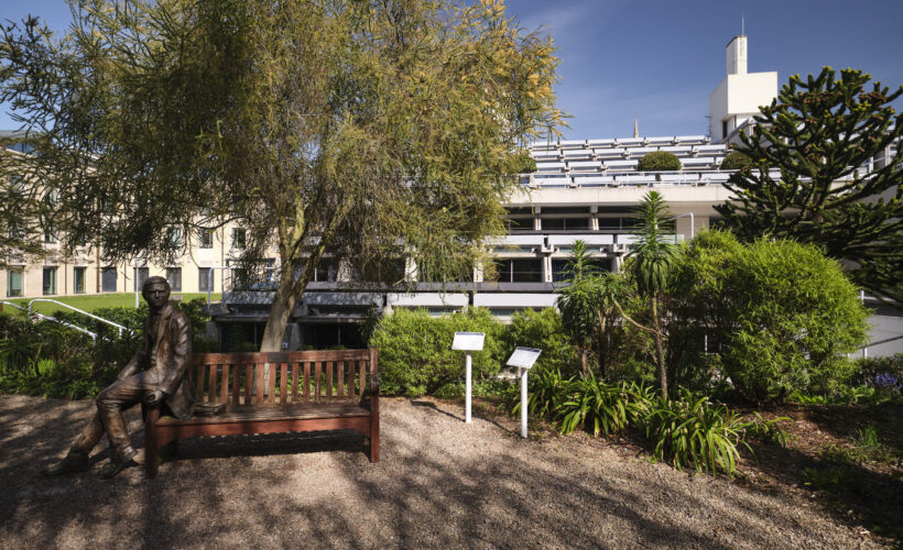 The Darwin Garden and Bench at Christ's College, Cambridge with New Court Building in the background