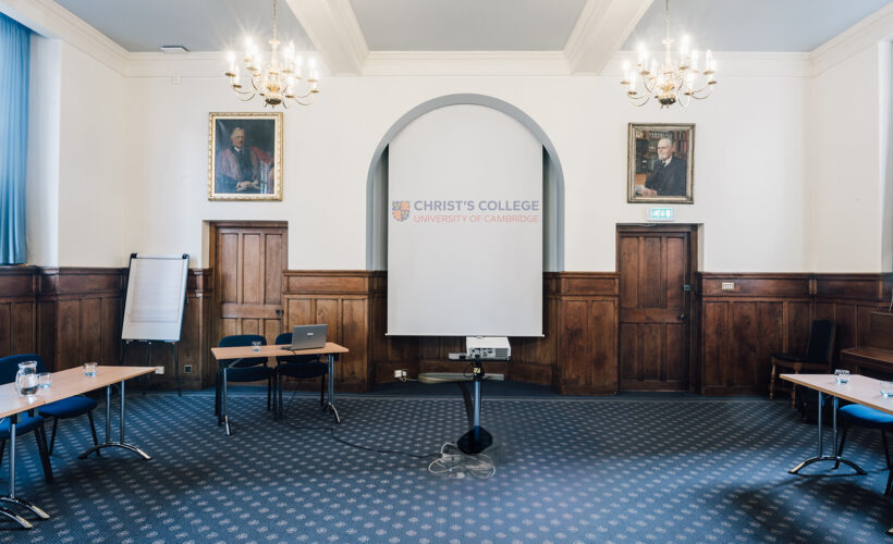 The Lloyd Room at Christ's College, Cambridge set up with a projector. A light airey room ideal for seminars and meetings.