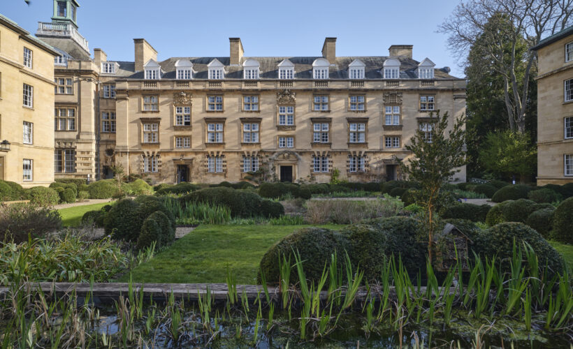 Third Court at Christ's College with a close up of the small pond area in the Fellows Court and a beautiful buildling in the background,