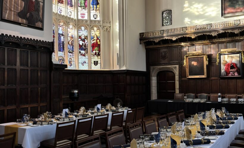 Christmas at Christ's College. The Great Hall set up for a Christmas Function, featuring the beautiful stained glass window.